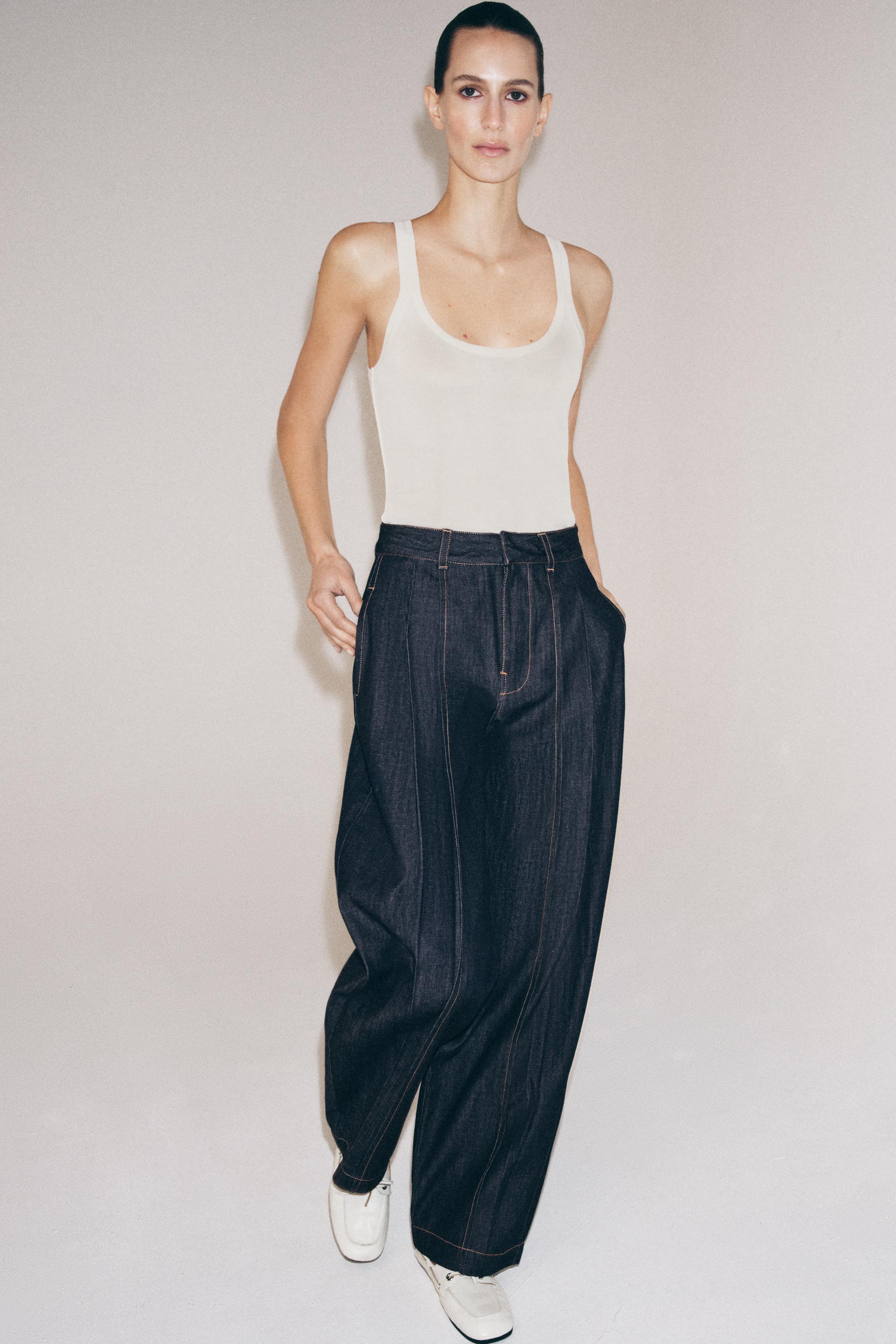 TOP EN MAILLE FINE SANS MANCHES
